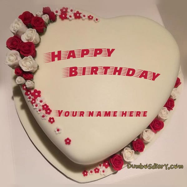 Beige color heart shaped birthday cake